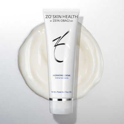 Hydrating Cr&egrave;me against a cream swatch
